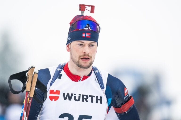 Sturla Holm Lægreid of Norway at zeroing ahead of men's 20 km individual during the IBU World Cup